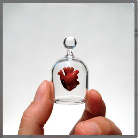 Blown Glass heart in a jar $400